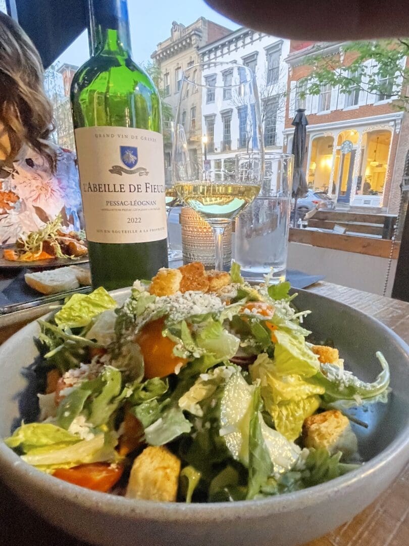 a Salad Appetizer Paired with Bordeaux Savignion Blanc Wine at the Tasting Room Restaurant in Downtown Frederick Md