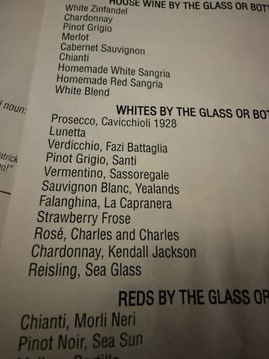 a Close up of a Cucina Massi Frederick Md Restaurant Menu Lists Various White Wines by the Glass or Bottle Including Prosecco Pinot Grigio Sauvignon Blanc Falanghina Strawberry Frose Chardonnay and Riesling