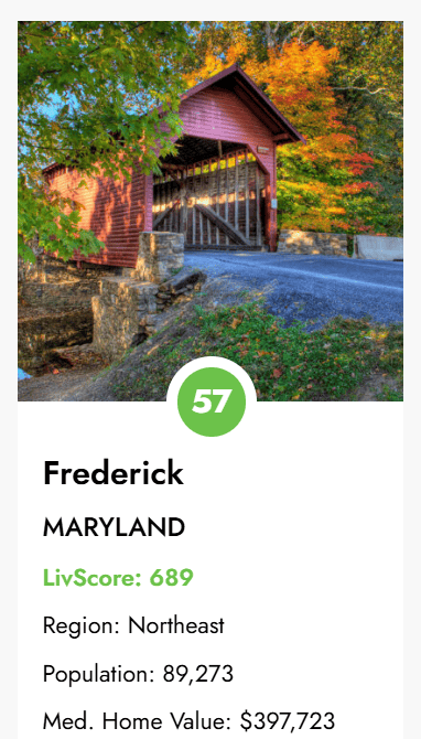 Red Covered Bridge with Autumn Leaves and a Green Circular Badge Reading 57